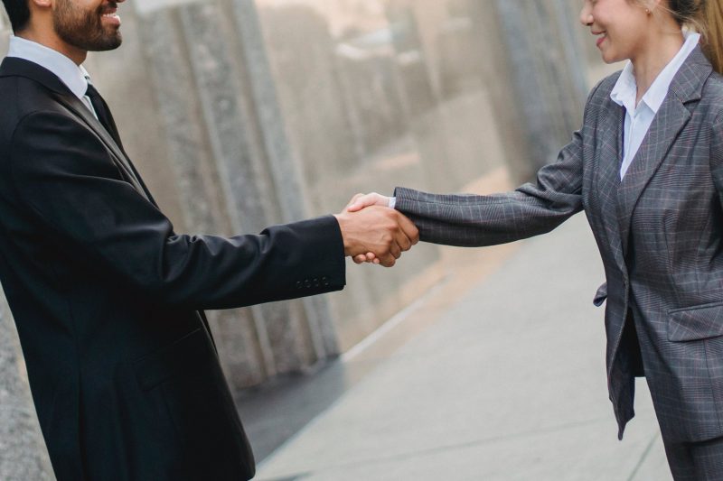 Two Shareholders Making a Verbal Agreement via a Handshake