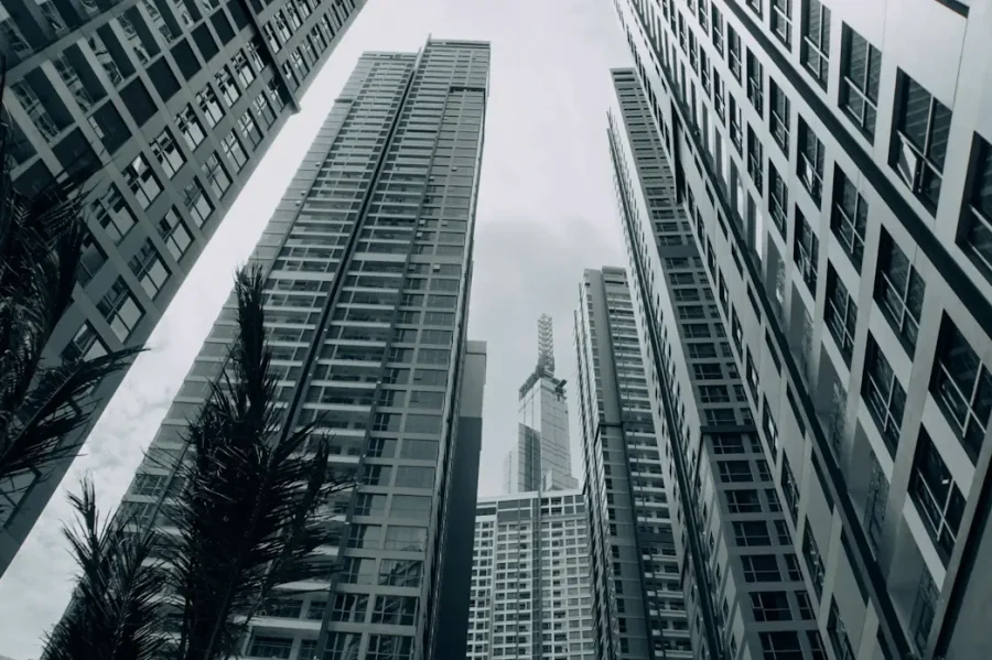Modern high-rise commercial buildings, representing commercial property.
